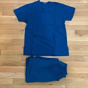 Turquoise/blue ish scrub set. Size XXS.